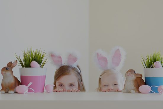 Two,Adorable,Little,Sisters,Wearing,Bunny,Ears,On,Easter,Day